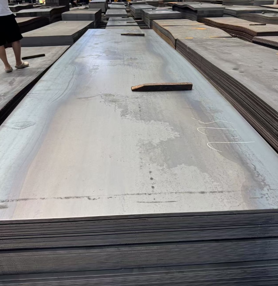 9672500e-f258-409c-924a-0e3e3e2f22f0_laminasi_panas_plat_baja_karbon_gudang_pabrik_stok.jpg